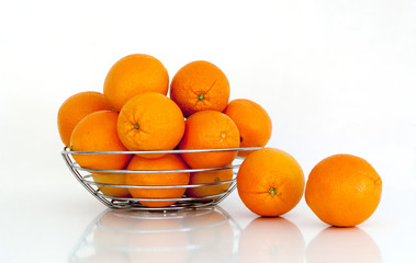 multiple oranges against a white background