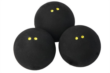 tr&ecirc;s bolas de squash