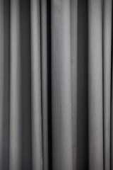 Fototapeta premium Grauer Vorhang