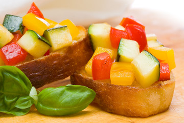 Bruschetta from zucchini and bell peppers