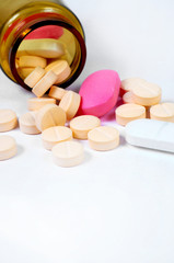 Medicine on white isoloated background with bottle