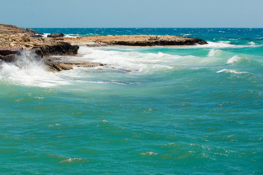 Waves in the sea near rocky coast