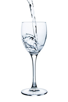 Wine glass with water over white background