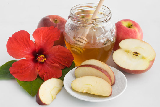 red flower,honey with apple for  jewish new year