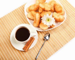 Breakfast coffee and croissants