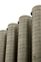 old grey metal silos