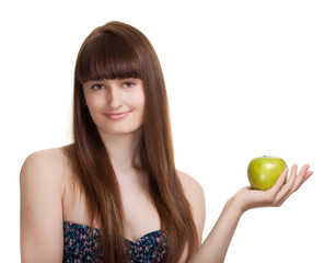 Young happy smiling woman with green apple isolated on white