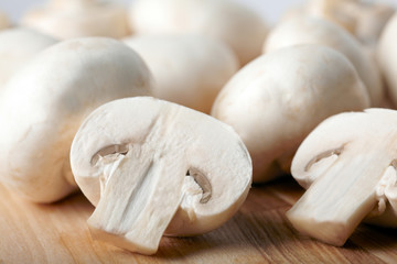 Champignon on wooden background