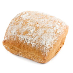 Baked rye bread with flour on top