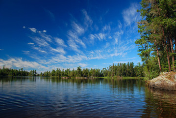 A wilderness lake and summer skies