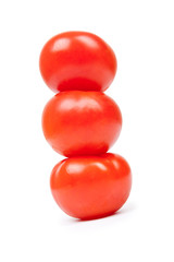 Some red tomatos in group isolated