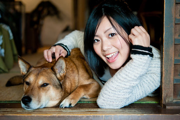 beautiful asian woman and dog