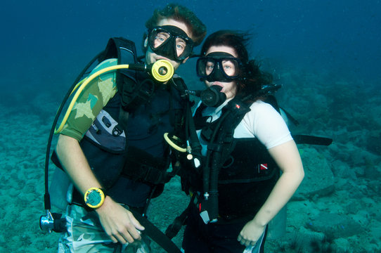 Scuba Couple Underwater Together