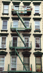 Fire ladder at old beautiful houses in new York