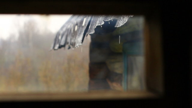 Rain through the rural house window