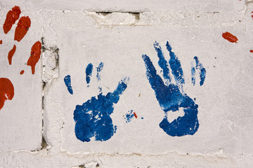 Red And Blue Handprints