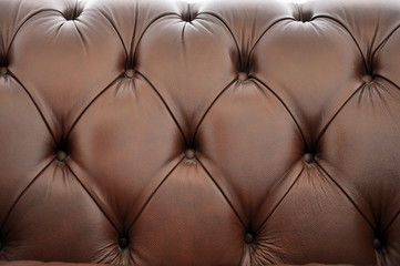 Macro shot brown leather sofa full frame.