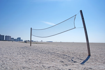 A beach volleyball net in Upham Beach, FL.