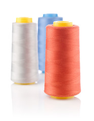 three spools of thread