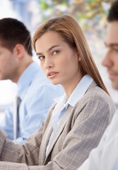 Portrait of beautiful businesswoman at meeting