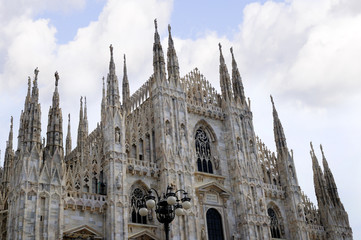 Fototapeta premium The Gothic facade of the Cathdral in Milan Italy