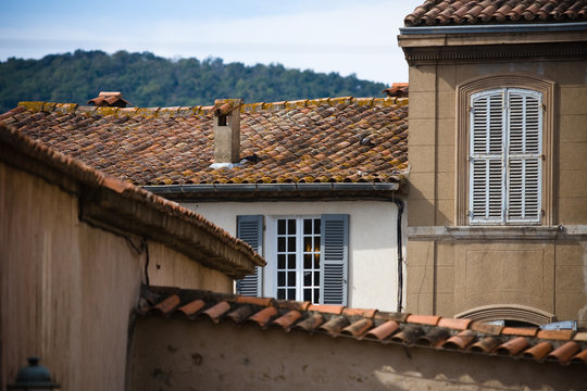 Walls of old houses with windows