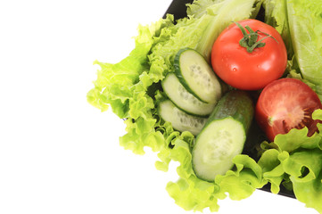 green salad, sliced tomato and cucumber