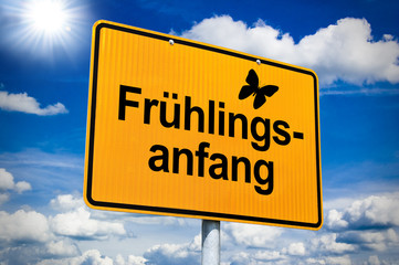 Ortsschild mit Frühlingsanfang