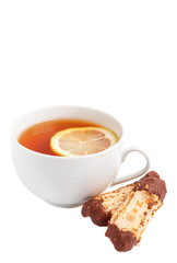 Cup of tea with lemon and chocolate cookies