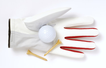Handschuh, Golfball und Tees
