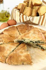 Homemade puff spinach pie with filo pastry
