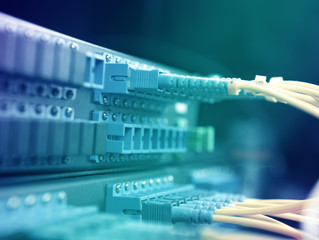 network cables and servers in a technology data center