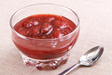 Strawberry jam in glass vase