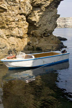 Fototapeta Boat and rock