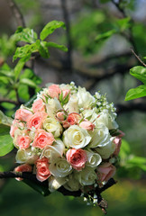 Bride's bouquet with wedding rings