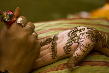 applying henna on hands,traditional Hindu wedding,India