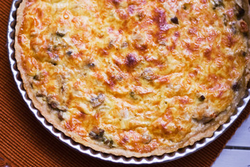 Homemade pie with cheese and vegetables.