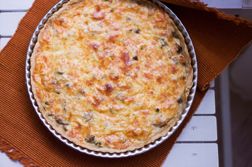 Homemade pie with cheese and vegetables.