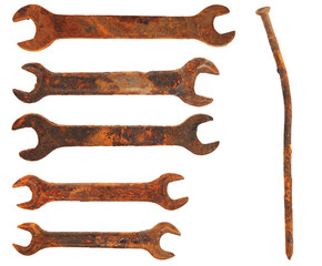 set very old rusty wrenches and rusty nail, isolated on white ba