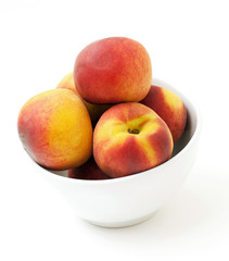 bowl with juicy peaches