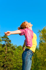 young woman enjoying of spring sun