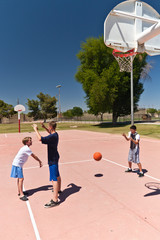 Boys Playing Basketball