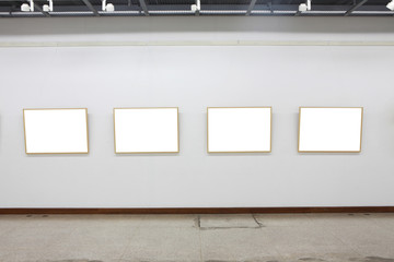 empty frames on white wall