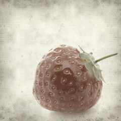 textured old paper background with strawberry