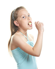 Cheerful little girl with lollipop
