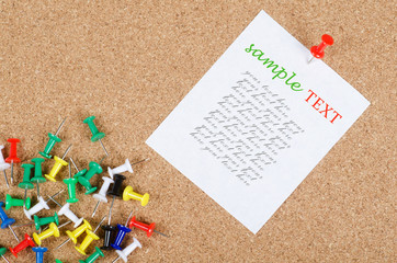 collection of note papers on corkboard