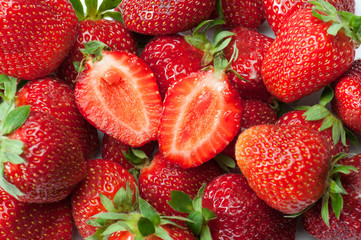 bunch of stawberries with open one