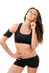 Fototapeta premium fitness beautiful slim brunette sport woman listening to music