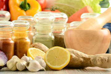 Spices and vegetables on kitchen table