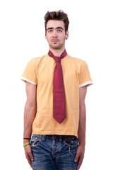 Fototapeta premium young man with a tshirt and a tie, making a funny face